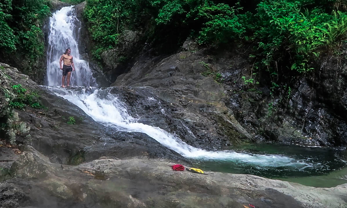 lenny through paradise standing at hicming falls in catanduanes philippines